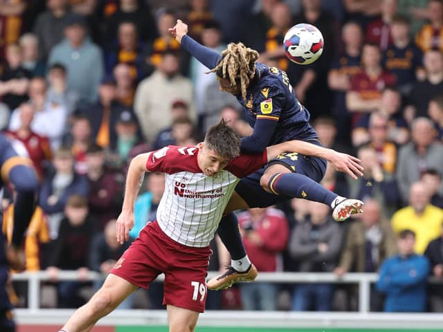 Keiron Bowie battles for an aerial ball during the defeat to Bradford City (Picture: Pete Norton)