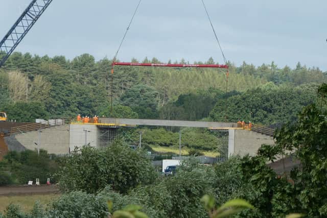 Latest stage of construction shows a bridge being installed linking two piers near Kentstone Close, Kingsthorpe