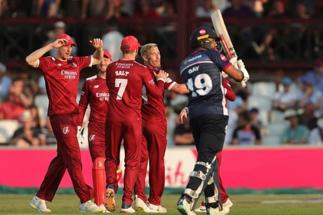 Luke Wood celebrates with his Lancashire Lightning team-mates after dismissing Emilio Gay (Pictue: David Rogers/Getty Images)