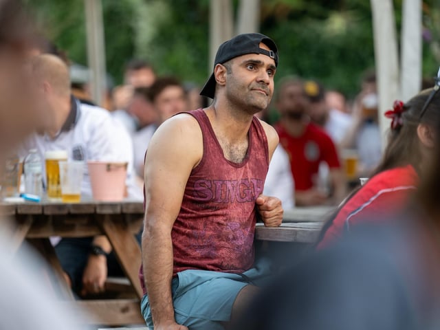 Fans watching England’s 0-0 draw with Ghana in the garden of The Black Prince in Northampton on Tuesday, June 23, 2026. Photo by David Jackson.