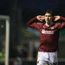 NORTHAMPTON, ENGLAND - JANUARY 01: Kieron Bowie of Northampton Town celebrates after scoring his sides goal from the penalty spot during the Sky Bet League One match between Northampton Town and Cheltenham Town at Sixfields on January 01, 2024 in Northampton, England. (Photo by Pete Norton/Getty Images)