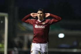 NORTHAMPTON, ENGLAND - JANUARY 01: Kieron Bowie of Northampton Town celebrates after scoring his sides goal from the penalty spot during the Sky Bet League One match between Northampton Town and Cheltenham Town at Sixfields on January 01, 2024 in Northampton, England. (Photo by Pete Norton/Getty Images)