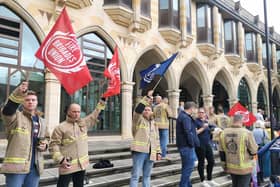 Firefighters are protesting outside The Guildhall in Northampton.