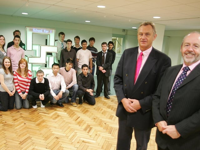 Sixth formers at Northampton School for boys with Head Mike Griffiths and Mark Lee.