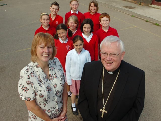 Headteacher Ann Allison, retires from Aston Le Walls School, at the end of term. Pictured with Ann, is Peter Doyle ( Bishop of the Catholic Diocese of Northampton ) & all the Year 6 leavers.