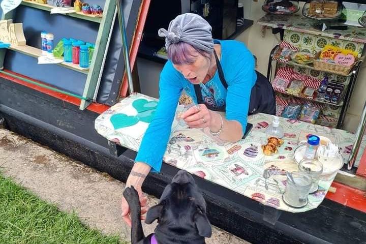 Daisy Hampshire pictured with a customer.