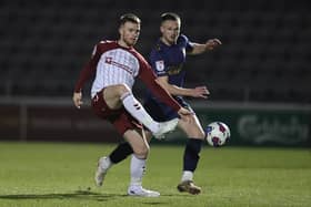 Cobblers midfielder Marc Leonard in action during the 0-0 draw with AFC Wimbledon at Sixfields (Picture: Pete Norton)