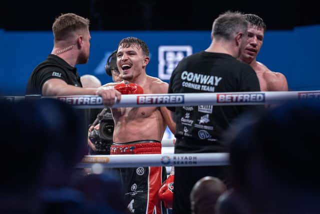 Kieron Conway (right) shows his disappointment as George Liddard celebrates his victory at York Hall on Friday (Picture: Dave Thompson / Matchroom Boxing)