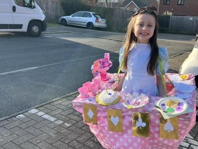 Olivia, aged seven, Alice at the Mad Hatters Tea Party.