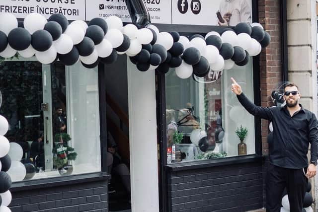 Adrian Mecheres is the owner of the business, which operates as both a barber shop and an academy offering beginner barbering courses.
