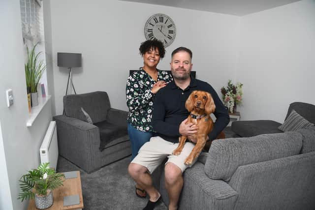 Kim and Jason relaxing at home with their dog Coco – they were the first residents to move in at Ashberry Homes’ The Wickets development.
