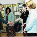Philippa Smith (centre) was thrilled to meet King Charles in 2000 along with her St Andrew's colleagues at the time 