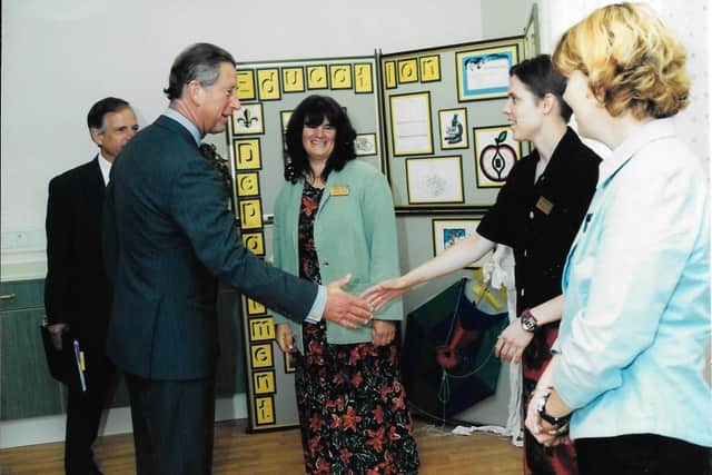 Philippa Smith (centre) was thrilled to meet King Charles in 2000 along with her St Andrew's colleagues at the time 