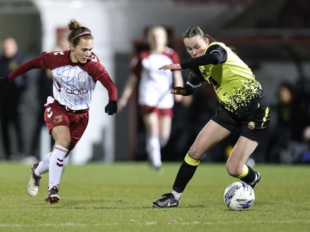 Zoe Boote goes past Connie Allen