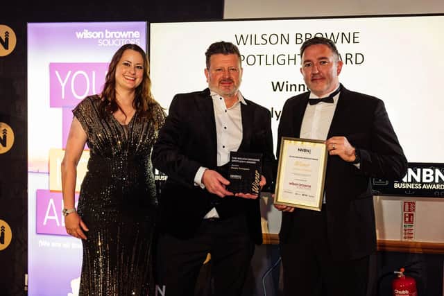 Hayley Mauro, Wilson Browne Solicitors presenting Matt Dann and Jon Bautista, co-founders of Simply Techspace with their award