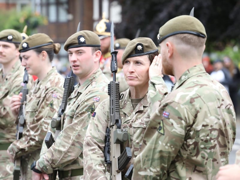 Kettering town centre: crowds line town centre to welcome The Royal Anglian Regiment for Armed Forces Day parade /National World