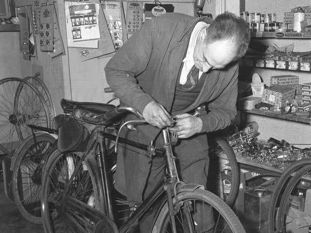 Repairs are carried out at a bike shop in Northampton. Again, there was no caption on the glass negative as to the name of the shop or the date