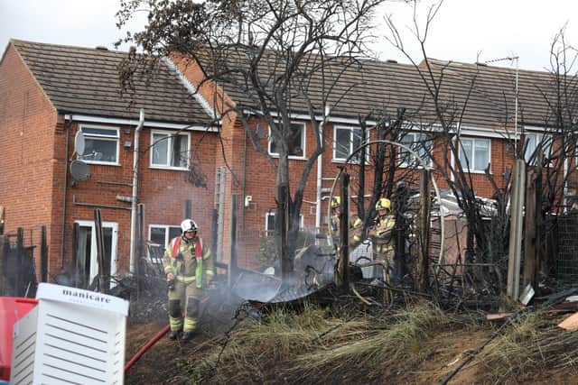 The garden fences, trees and the gardens in Slim Close were destroyed by the fire