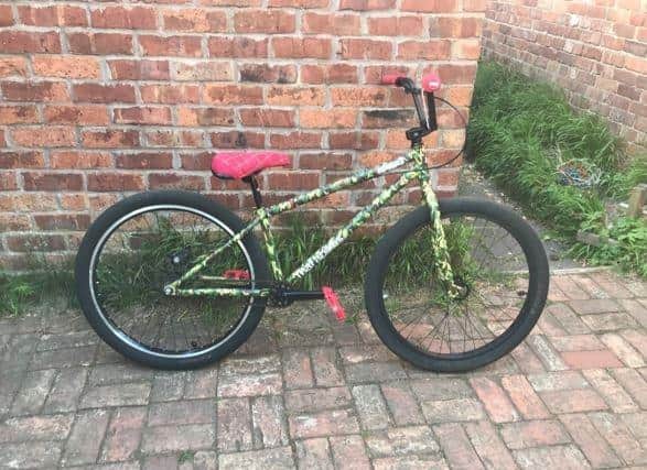This bicycle was stolen in the robbery.