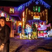 Melanie and Nick Phipps outside their home in Vienne Close during the festive season in 2019.