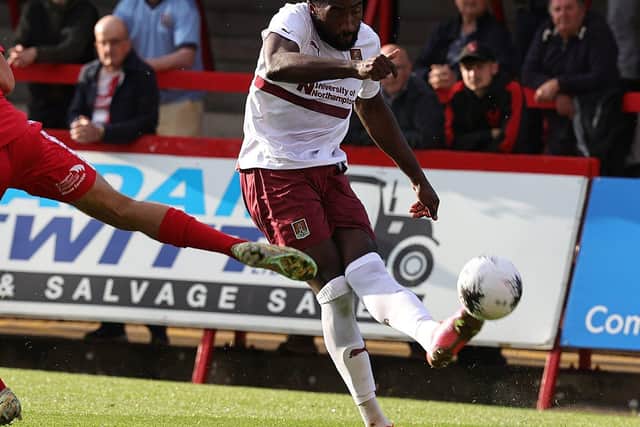 Manny Monthé clears the ball