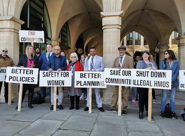 Protesters outside The Guildhall in April just before a full council meeting