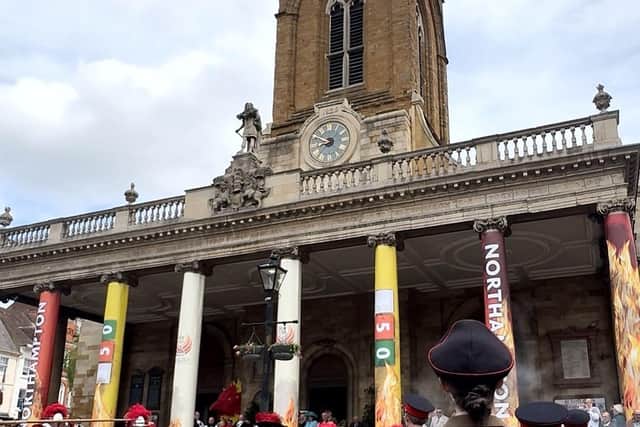 Musket smoke drifts across the All Saints piazza while the rewreathed statue of Charles 2nd looks down on Oak Apple Day 2025