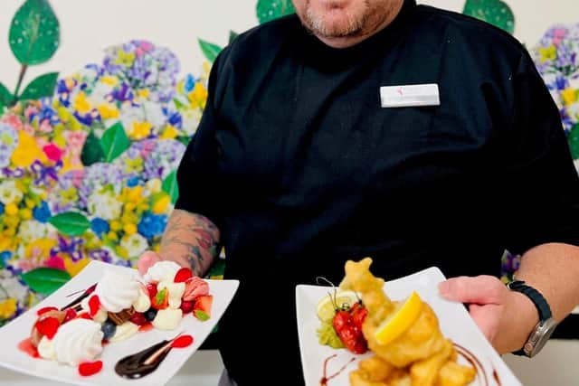 Simon Lewis showcasing some of his dishes