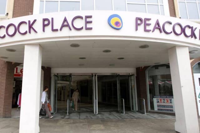 The old Peacock Place signage at the Market Square entrance in 2010.