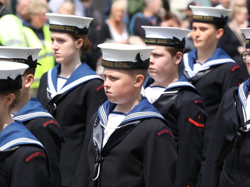 Kettering town centre: crowds line town centre to welcome The Royal Anglian Regiment for Armed Forces Day parade /National World