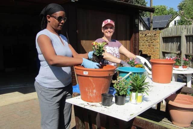 Volunteers gardening during the last planting project in 2018.