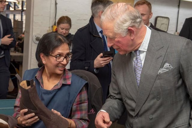 Prince Charles speaks to Palo Kaur as he visits Royal shoemakers Tricker’s