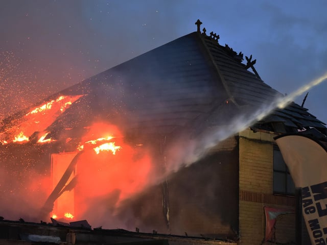 More than 80 firefighters were at the Sixfields Tavern at the height of the fire, exacerbated by high winds.