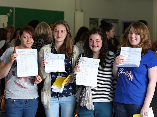 2012 - Students from Northampton School For Girls picking up their GCSE results. Sophie Church, Genevieve Roberts, Lizzie Timmins and Hannah Thomas.