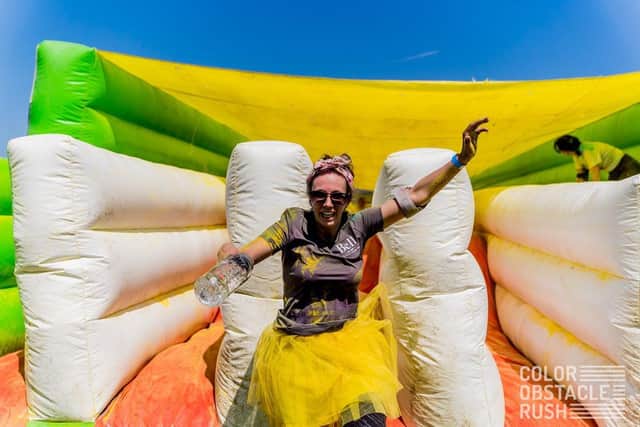 Kimberley Davidson from Bell of Northampton pictured taking part in the Color Obstacle Rush