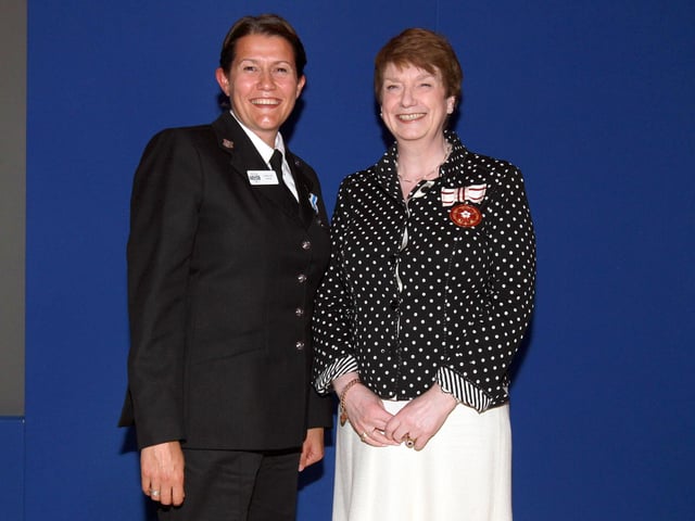 2013 - Northamptonshire Police Long Service awards ceremony takes place at their Headquarters, Wootton Hall, Northampton. Constable Caroline Payne, presented by Deirdre Newham.