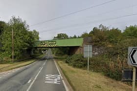 A lorry was stuck under the railway bridge on the A428.