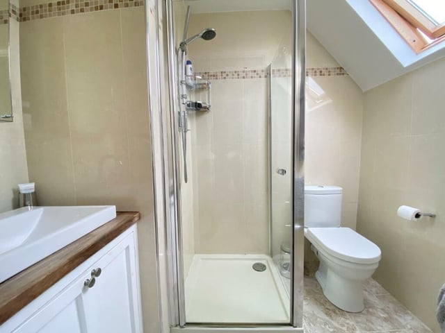 An ensuite bathroom adjoin one of the four bedrooms