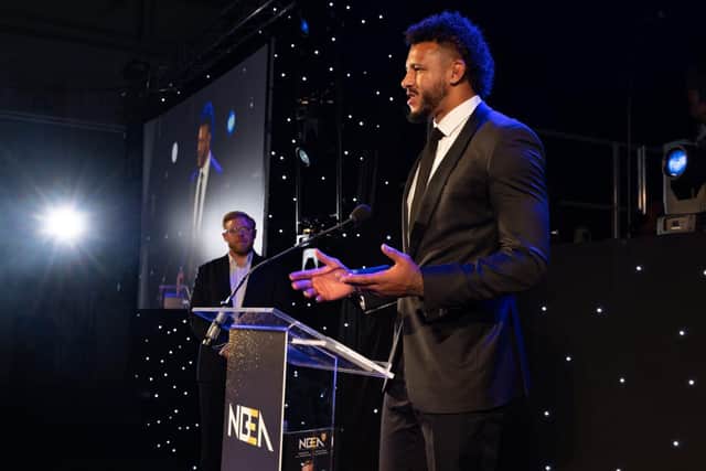Courtney speaks after receiving his award.