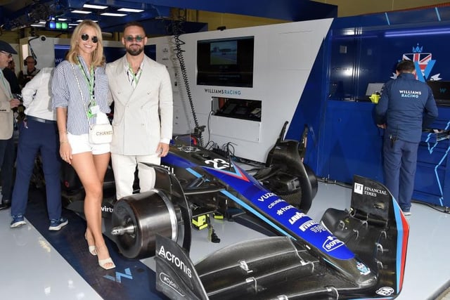 Model Vogue Matthews and reality star husband Spencer in the Williams Racing garage