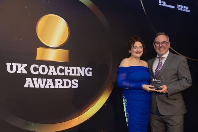 Shoney Morrish collects her award at the UK Coaching Awards ceremony