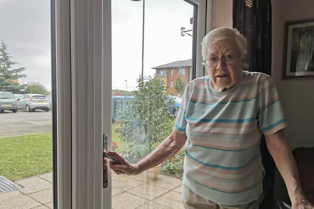 Ann Church can't open her patio door from the inside