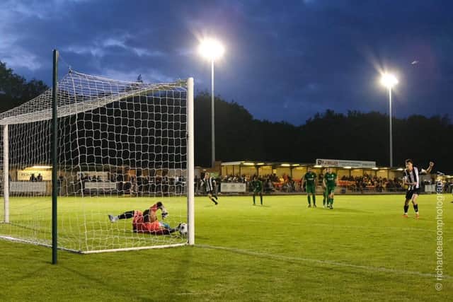 Duane Morgan celebrating scoring against Moulton, photo by Richard Eason.