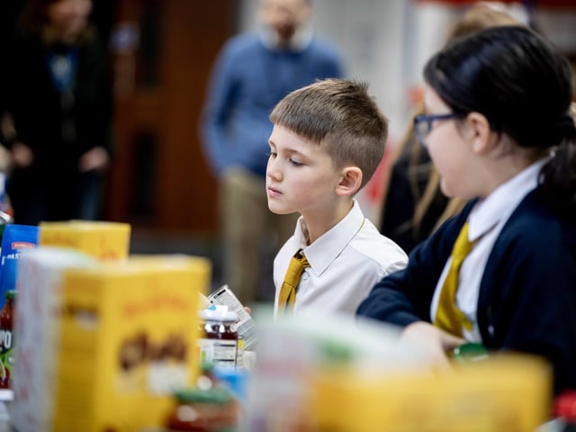 70 bags of food were packed by the 11 hardworking students, who learnt the importance of showing kindness and empathy to the community.