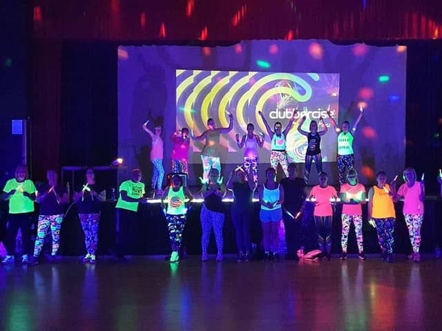 The dance fitness class is taught in a darkened room with disco lights and glow sticks, to music varying from the nineties to present day so there is something for everyone.