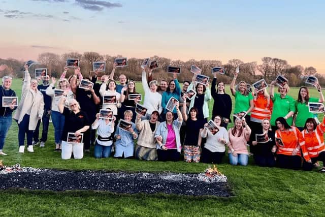 Participants of the annual firewalk in aid of The Lewis Foundation