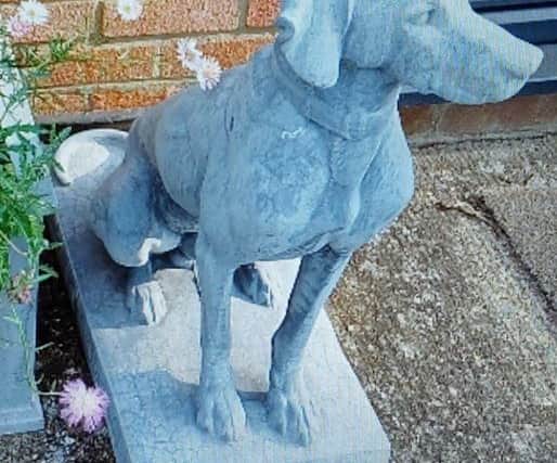 The cast stone statue of a hunting dog was stolen from a home in Northampton.