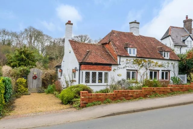 This four bedroom cottage in Church Road, Swanmore, is on sale for £925,000. It is listed by Charters Bishops Waltham.