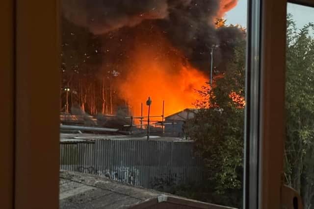 Billowing black smoke and bright orange flames were seen from across the town between 8.30pm and 8.45pm last night (August 20), as emergency service vehicles sped through Semilong to Apex Scaffolding. Photo: Chris Marriott.