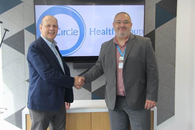British Skin Foundation CEO, Matthew Patey OBE thanks Adam Busby, Group Clinical Director  at CHG